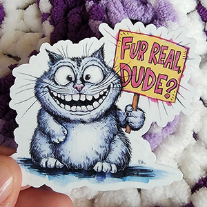 A cartoon cat with a wide-eyed grin holds a sign reading "Fur Real, Dude?" in vibrant colors.