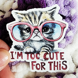 Adorable kitten with oversized glasses and the caption "I'm Too Cute For This."