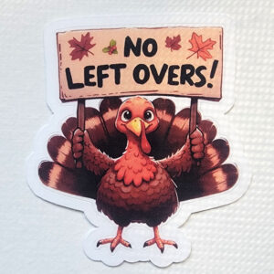 Cartoon turkey sticker holding a sign that says "No Left Overs!" decorated with fall leaves.